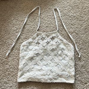 White halter crop top with flower lace design